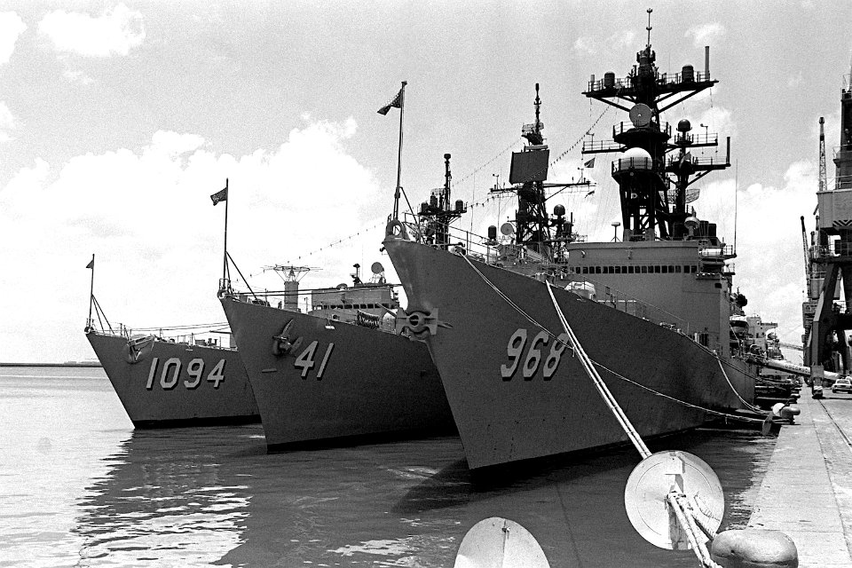 Port bow view of USS Arthur W. Radford (DD-968), USS King (DDG-41), USS Pharris (FF-1094) in port during Unitas XXI 1980 DN-SN-83-00273