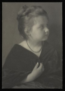 Portrait of a girl with a necklace clasping a shawl) - Alice Austin LCCN2004676234