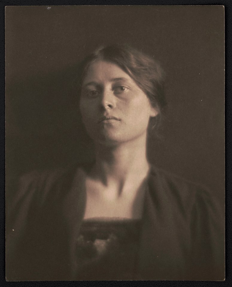 Portrait of an unidentified woman, facing front, wearing dark clothing, square neckline LCCN2017659330