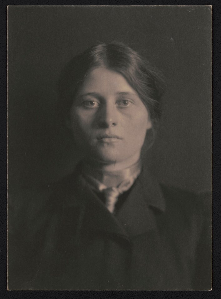 Portrait of an unidentified woman, facing front, wearing dark clothing and scarf LCCN2017659331