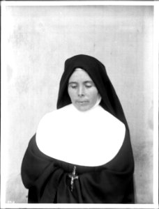 Portrait of a sister with downcast eyes at Mission San Carlos Borromeo, Monterey, ca.1906 (CHS-4113) photo