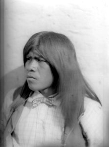 Portrait of a young Mojave Indian man who graduated from school, ca.1900 (CHS-3417)
