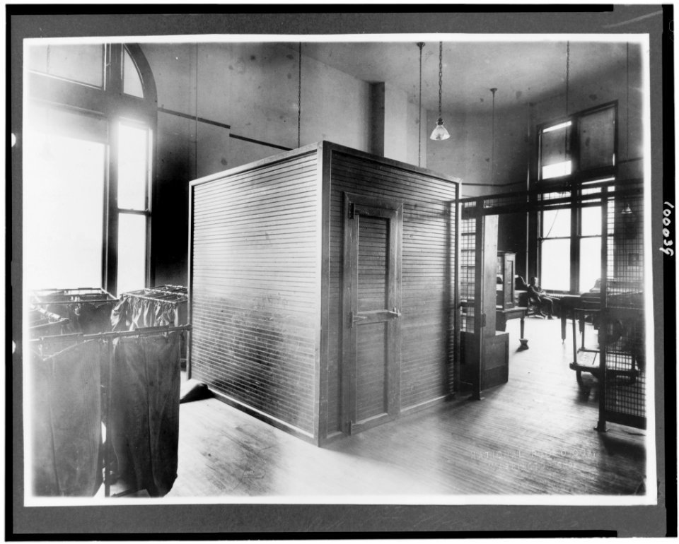Postal service offices with man seated at desk, U.S. Post Office, Washington, D.C.) - National Photo Co., Washington, D.C LCCN90709846