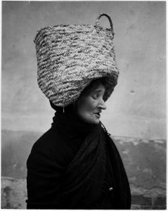 Portugal. In Portugal nearly everything is carried on the heads of the women. In the country, it is the exception to... - NARA - 541751 photo