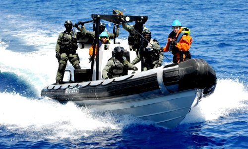 Portuguese Fuzileiros in a boat making a visit, board, search and seizure (VBSS) drill during Phoenix Express 2010 (PE-10)