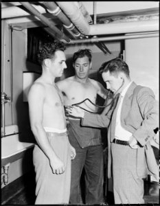 Pre-employment examination of miners is undertaken by doctor in company owned hospital. U.S. Coal & Coke Company... - NARA - 541411