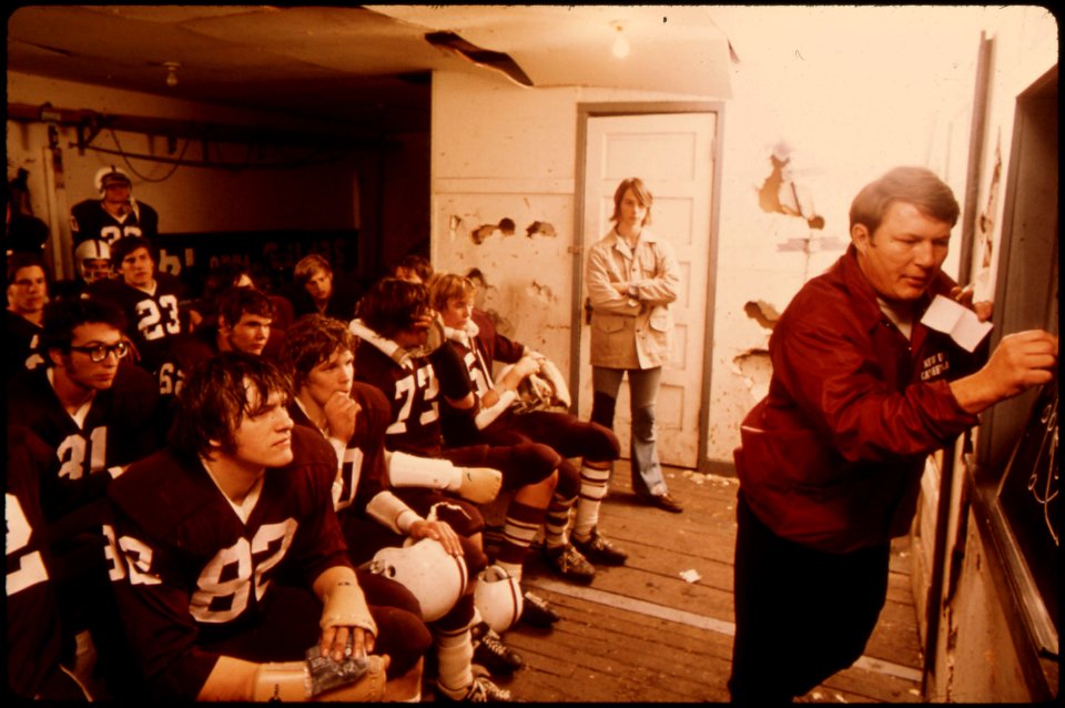 Pregame-discussion-by-the-coach-for-cathedral-senior-high-school-football-players-prior-to-a-game-at-johnson-park-in-new-ulm-minnesota 4726884403 o