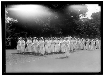 PREPAREDNESS PARADE. MANY WOMEN CARRYING HUGE FLAG LCCN2016866656