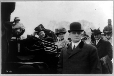 Pres. and Mrs. Taft smiling at crowds on way to the White House LCCN2002717897