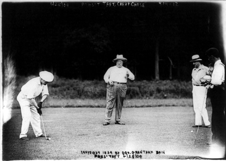 Pres. William H. Taft playing golf, Chevy Chase Country Club, 3 other men in picture, 1909 June 28 LCCN2002706377
