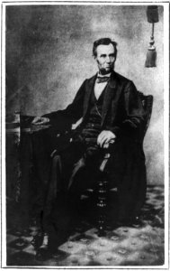 President Abraham Lincoln, full-length portrait, seated in a Brady chair, November 8, 1863 LCCN2009630680