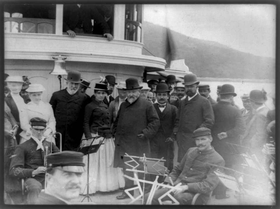 President Benjamin Harrison with James G. Blaine, Secretary of State, Henry Cabot Lodge, and group of other people posed, possibly on the forward deck of the Frenchman's Bay steamer Sappho, LCCN89706549