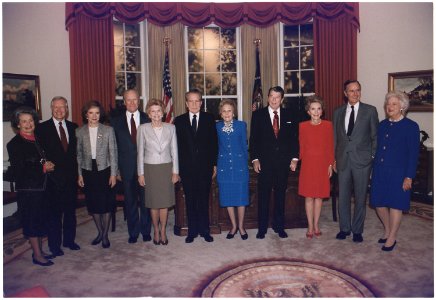 President and Mrs. Bush pose with the former presidents and first ladies in the replica of the Oval Office at the... - NARA - 186441