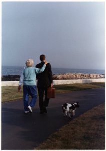 President and Mrs. Bush walk towards their home on Walker's Point after the President's arrival from Washington - NARA - 186396 photo