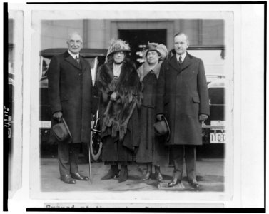 President and Mrs. Harding and Vice President and Mrs. Coolidge standing at Union Station, on their arrival for the inauguration LCCN94511979