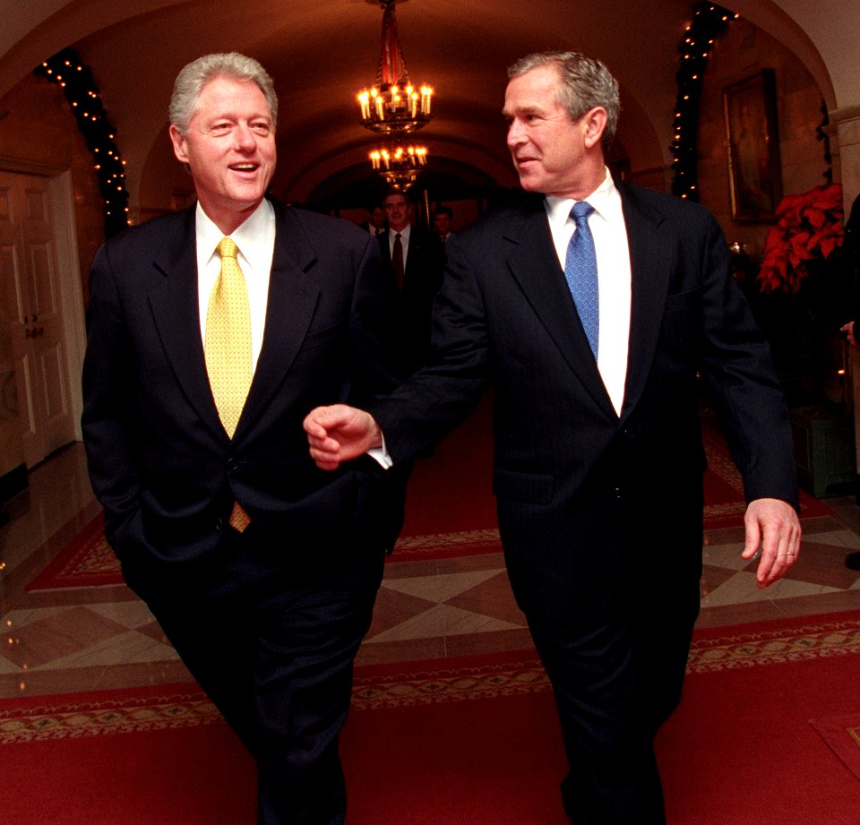 President Bill Clinton and President-Elect George W. Bush walk through the White House (1)