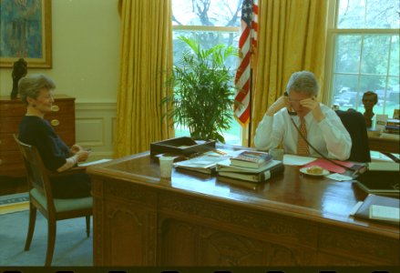 President Bill Clinton talking on the telephone in the Oval Office with President Francois Mitterand of France (06)