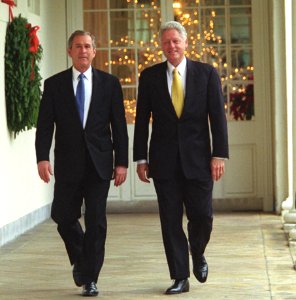 President Bill Clinton and President-Elect George W. Bush walk along the White House colonnade to the Oval Office (cropped)