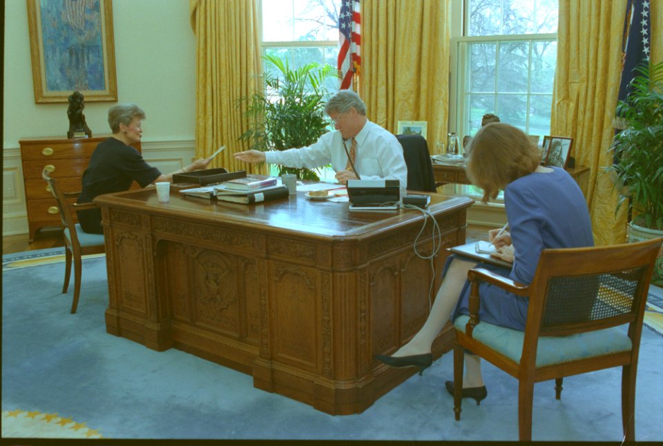 President Bill Clinton talking on the telephone in the Oval Office with President Francois Mitterand of France (08)