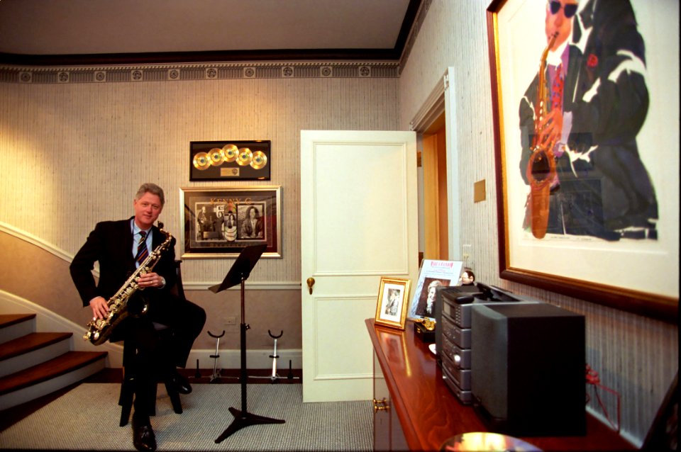 President Bill Clinton with his saxophone in the Music Room