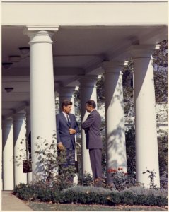 President confers with Secretary of Defense. President Kennedy, Secretary of Defense Robert S. McNamara. White House... - NARA - 194274 photo