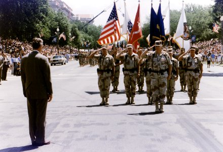 President Bush greets General H. Norman Schwarzkopf who leads the Desert Storm Homecoming Parade in Washington, D.C - NARA - 186434