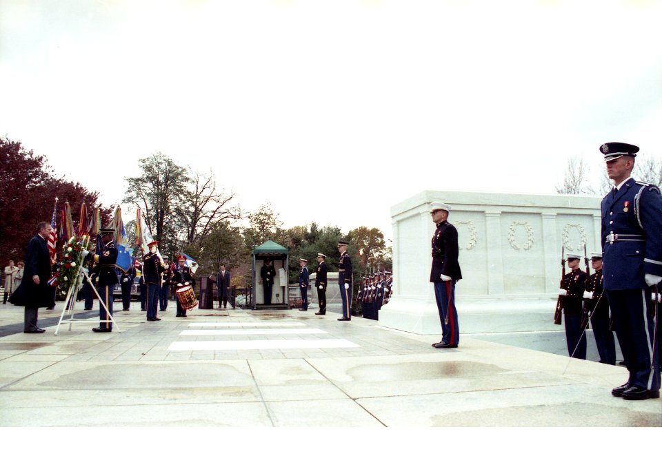 President George H. W. Bush participates in a wreath laying ceremony at the Tomb of the Unknowns