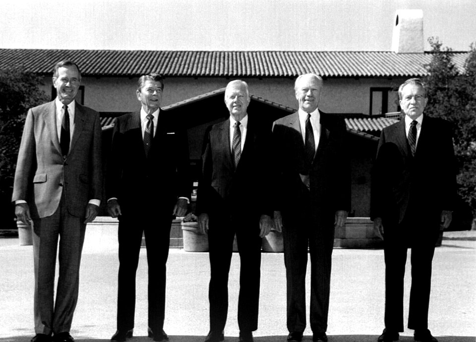 President George H. W. Bush poses for a photograph with four of his predecessors