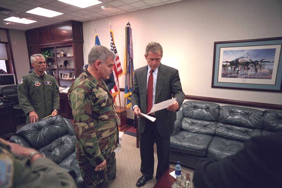 President George W. Bush Reviews a Speech with Military Personnel at General Dougherty Conference Center at Barksdale Air Force Base in Louisiana