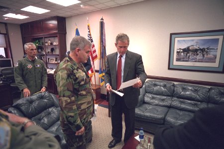 President George W. Bush Reviews a Speech with Military Personnel at General Dougherty Conference Center at Barksdale Air Force Base in Louisiana