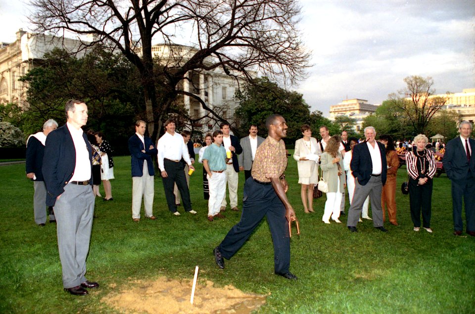 President George H. W. Bush Pitches Horseshoes with Players at the Redskins Barbecue at the White House