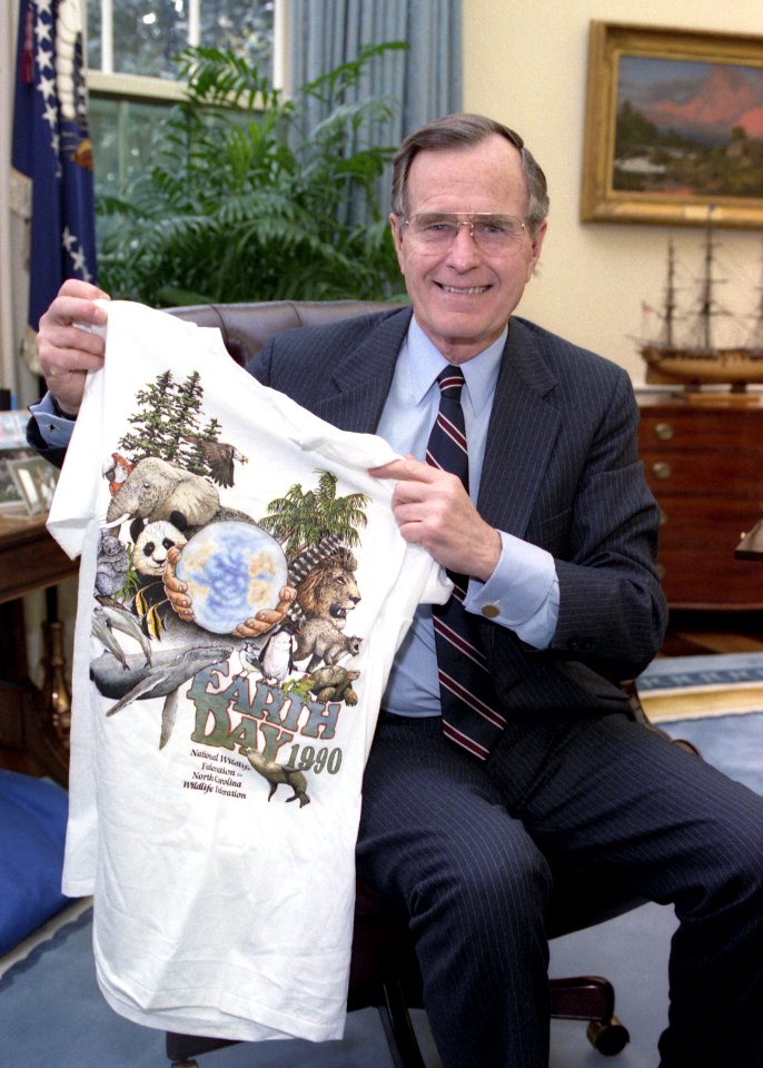 President George H. W. Bush Shows his T-Shirt Honoring Earth Day 1990