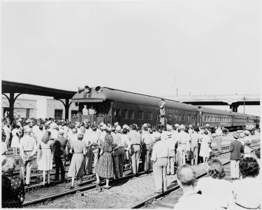 President Harry S. Truman and President Romulo Gallegos of Venezuela standing on the rear platform of the... - NARA - 199888