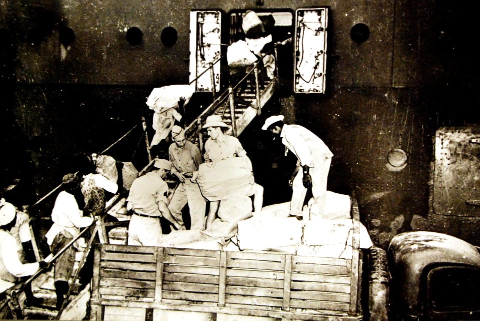 Presents for families being loaded onto a transport, India 1942 (28020976525)