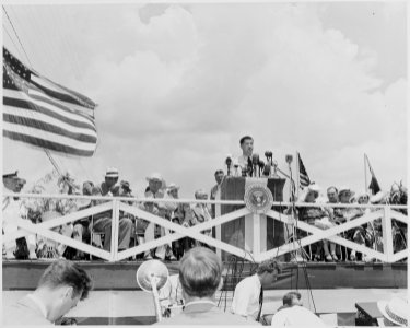 President Harry S. Truman, President Romulo Gallegos of Venezuela, and other dignitaries on the reviewing platform in... - NARA - 199914