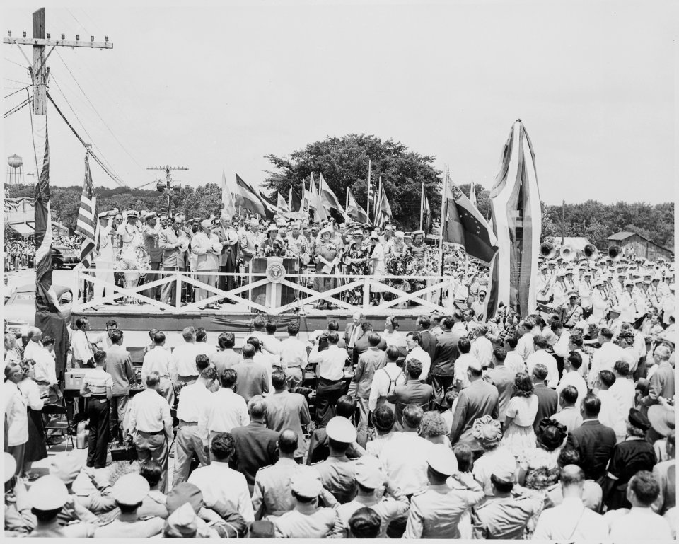 President Harry S. Truman, President Romulo Gallegos of Venezuela, and other dignitaries on the reviewing platform... - NARA - 199920