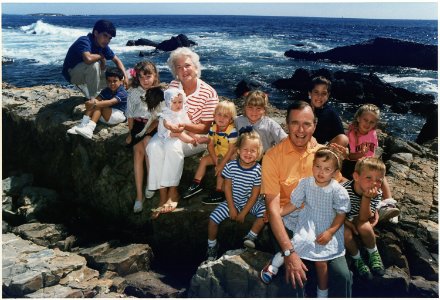 President and Mrs. Bush pose with their grandchildren on the rocks at Walker's Point in Kennebunkport, Maine - NARA - 186395