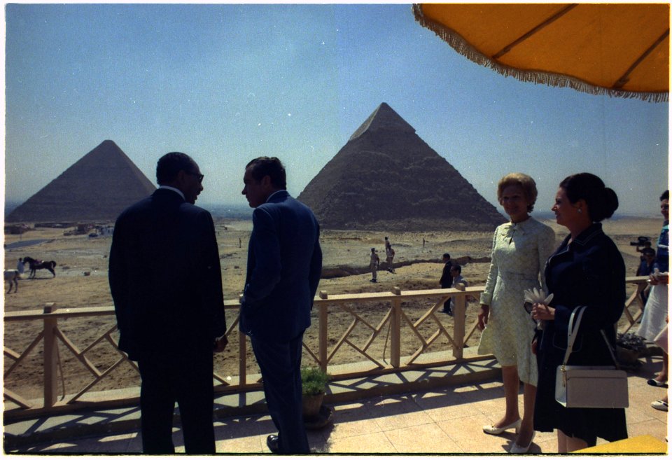 President and Mrs. Nixon with Mr. and Mrs. Anwar Sadat at the site of the great pyramids at Giza. - NARA - 194581