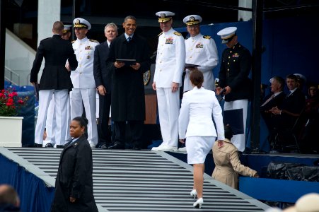 President Barack Obama, center, Secretary of the U.S. Navy Ray Mabus and Chief of Naval Operations Adm. Jonathan Greenert pass out diplomas during the U.S. Naval Academy graduation and commissioning ceremony 130524-N-WL435-701 photo