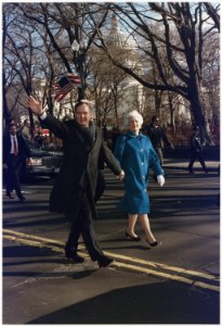President and Mrs. Bush walk along Pennsylvania Avenue after the President's Inauguration - NARA - 186388