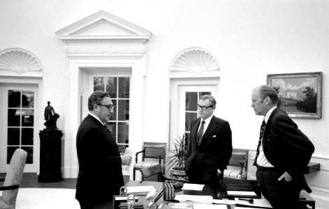 President Gerald Ford meets with Secretary Henry Kissinger and Vice President Nelson Rockefeller photo