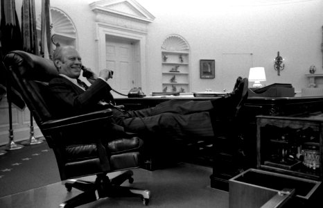 President Gerald Ford takes a call after delivering his Address on the Economy to a Joint Session of Congress