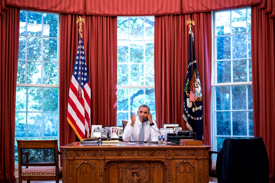 President Barack Obama talks on the phone with Cuba President Raúl Castro in the Oval Office, Sept. 18, 2015