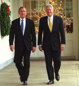 President Bill Clinton and President-Elect George W. Bush walk along the White House colonnade to the Oval Office (1) photo