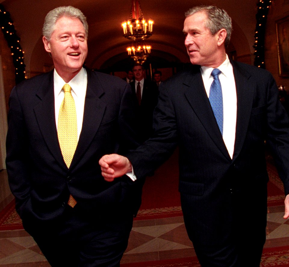 President Bill Clinton and President-Elect George W. Bush walk through the White House (2)