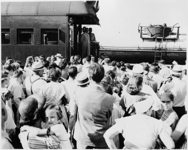 President Harry S. Truman standing on the rear platform of the presidential train, probably in Bolivar, Missouri. A... - NARA - 199881