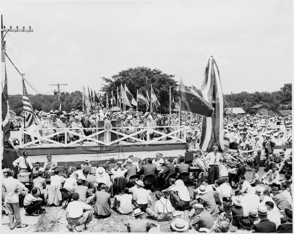 President Harry S. Truman, President Romulo Gallegos of Venezuela, and other dignitaries on the reviewing platform in... - NARA - 199915