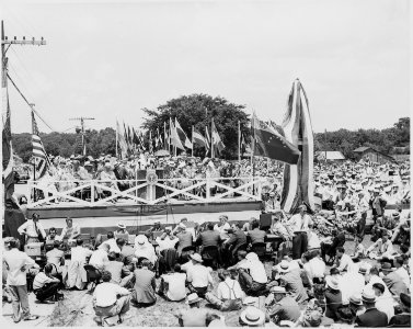 President Harry S. Truman, President Romulo Gallegos of Venezuela, and other dignitaries on the reviewing platform in... - NARA - 199915