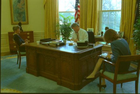 President Bill Clinton talking on the telephone in the Oval Office with President Francois Mitterand of France (07)