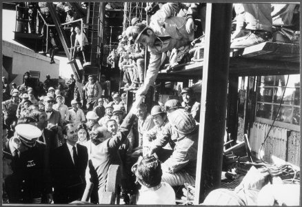 President Nixon greeting and shaking hands with construction workers after his address at National Steel and... - NARA - 194751
